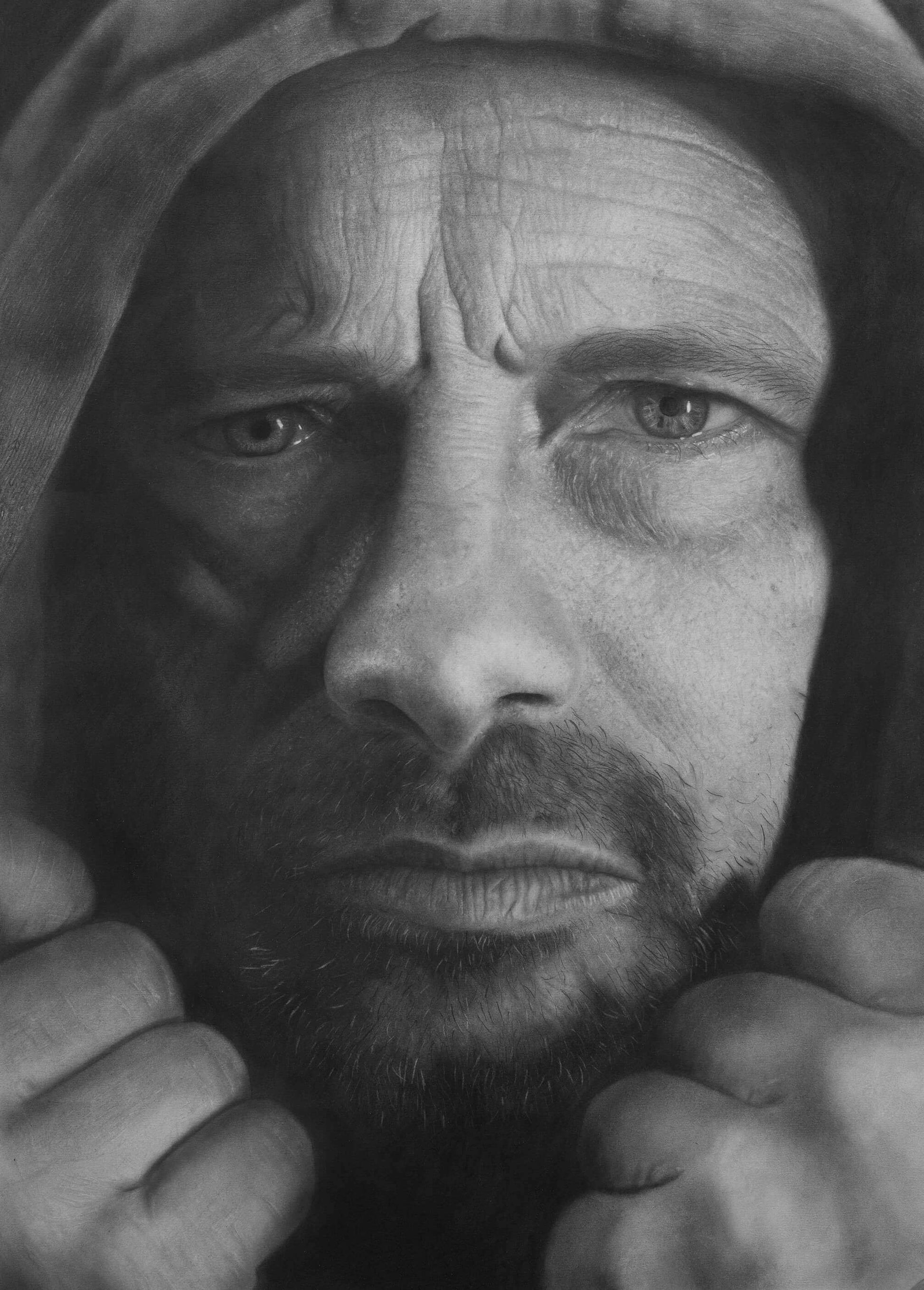 Charcoal elf portrait drawing of Simon Knight, showing emotion. Mental health